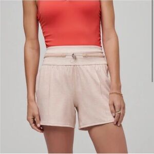 TravisMathew | Women's Queenstown MoveKnit Shorts in Heather Cuban Sand Medium